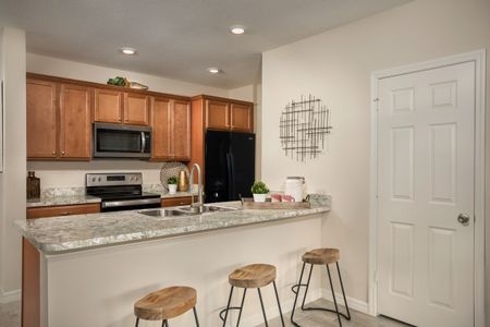 Bellaviva Townhomes at Westside by KB Home in Davenport - photo 5