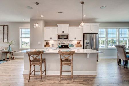 Townes At Gateway Commons by McKee Homes in Wake Forest - photo 5 5