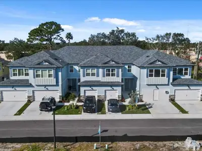 The Towns At Long Bayou by Gulfwind Homes in Seminole - photo 1 1