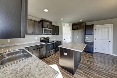 Sky Ranch – Highland Collection by Challenger Homes in Watkins - photo 10