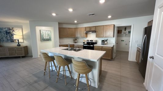 The Enclaves at Desert Oasis by KB Home in Surprise - photo 16 16