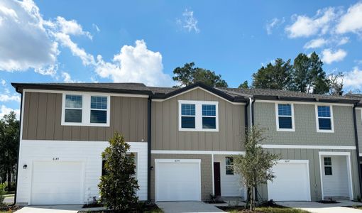 Tyson Townhomes by Starlight Homes in Zephyrhills - photo 1 1