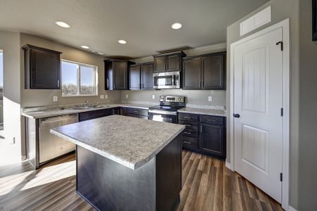 Sky Ranch – Highland Collection by Challenger Homes in Watkins - photo 8