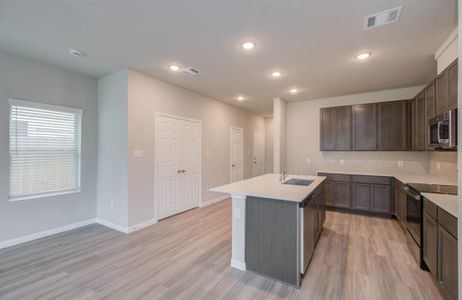 Island kitchen with counter seating