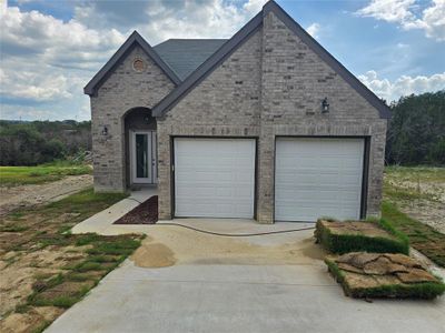 New construction Single-Family house 1017 Thicket Trail, Granbury, TX 76048 - photo 0