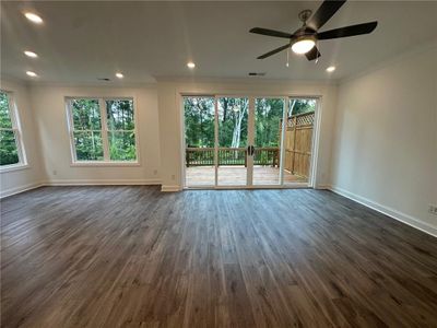 There will never be lack of natural light in this home with the huge amount of windows and sliders floor to ceiling. Photo not actual home, but previously built Stockton plan.