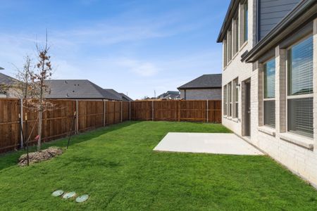 Back Yard in the Mesquite home plan by Trophy Signature Homes – REPRESENTATIVE PHOTO