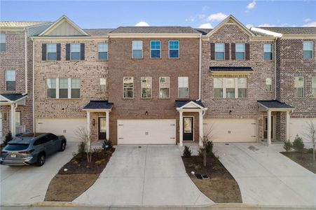 New construction Townhouse house 3457 Hidden Valley Circle, Lawrenceville, GA 30044 - photo 0