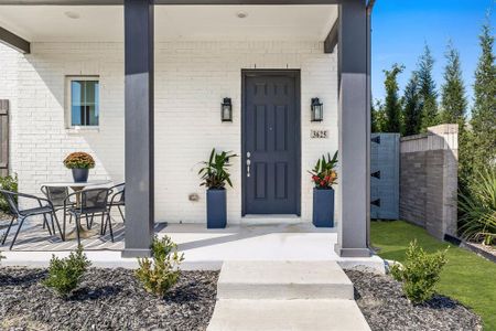 Doorway to property featuring a porch