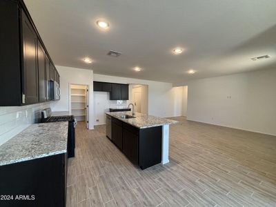 New construction Single-Family house 11878 N Uphoff Drive, Maricopa, AZ 85139 - photo 13 13