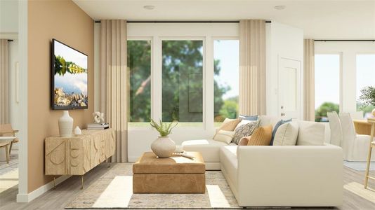 Sitting room with light hardwood / wood-style flooring