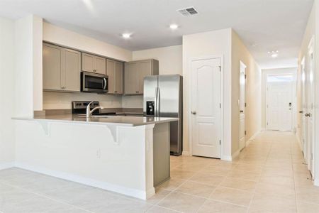 New construction Townhouse house 2810 Puffin Place, Davenport, FL 33837 - photo 2 2