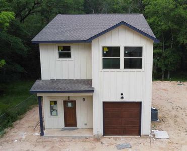 New construction Single-Family house 1005 Spokane River Road, Conroe, TX 77316 - photo 0