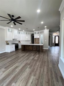 Other Interior Picture of a Similar Kitchen Open to the Living Room Built by Tx Best Home Builders.