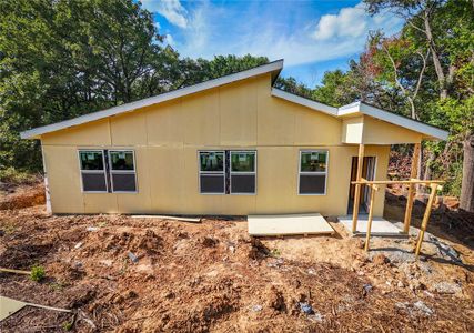 Rear view of property with a patio area