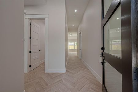 As soon as you walk in you're greeting with a beautiful herringbone tile floor.