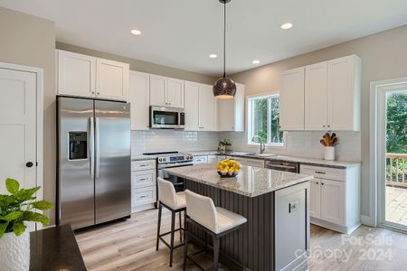 Great kitchen and open layout for food prep while watching the game or a cooking show!