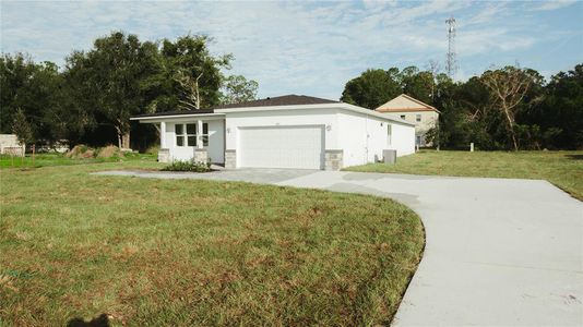 New construction Single-Family house 606 Plumosa Drive, Lake Wales, FL 33898 - photo 0 0