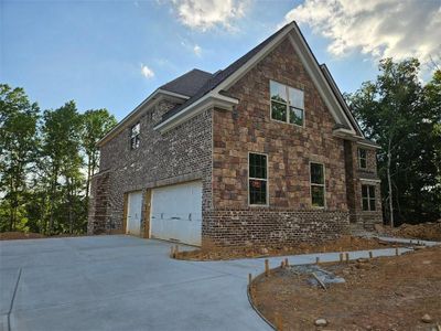 New construction Single-Family house 5610 Livesage Drive, Atlanta, GA 30349 - photo 0