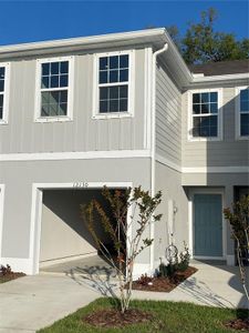 New construction Townhouse house 12130 Grizzly Lane, New Port Richey, FL 34654 - photo 0