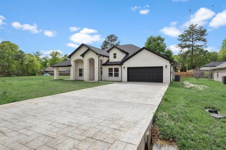 New construction Single-Family house 69 County Road 3668, Splendora, TX 77372 - photo 0 0