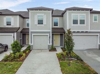 New construction Townhouse house 31627 Blue Passing Loop, Wesley Chapel, FL 33545 - photo 0