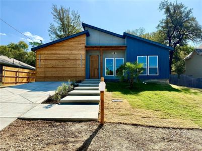 Contemporary home with a front lawn