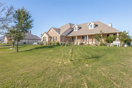 View of front of property with a front lawn