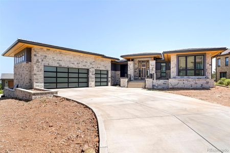 Oversized garage for gear and golf cart. Landscaping is forthcoming.