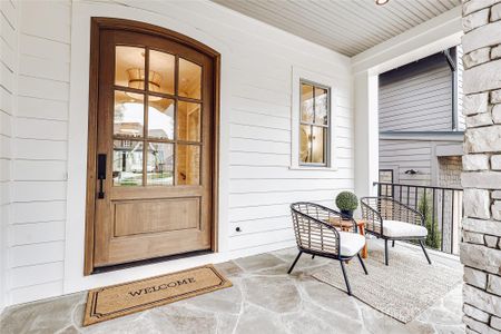 Gracious front door welcomes you to this newly constructed home.