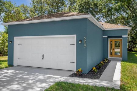 New construction Single-Family house 5237 Golden Gate Boulevard, Polk City, FL 33868 - photo 0 0