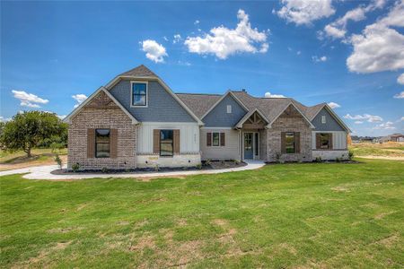 View of front of house with a front lawn