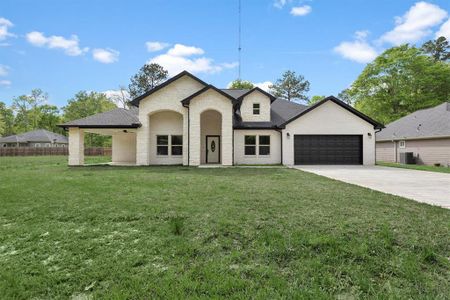 New construction Single-Family house 69 County Road 3668, Splendora, TX 77372 - photo 1 1