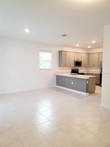 New construction Townhouse house 2305 Brook Marsh Loop, Kissimmee, FL 34747 Pampas- photo 4 4