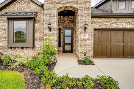 Entrance to property with a garage