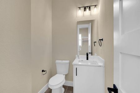 Bathroom with vanity and toilet