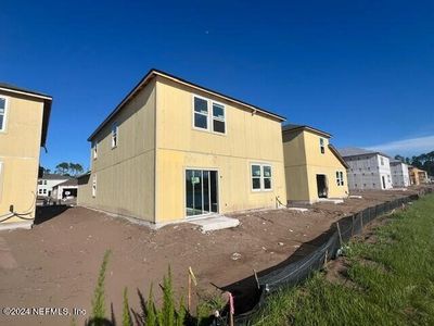 New construction Single-Family house 14750 Macadamia Lane, Unit 84, Jacksonville, FL 32218 - photo 6 6