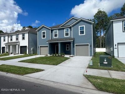 New construction Townhouse house 14580 Macadamia Lane, Unit 287, Jacksonville, FL 32218 - photo 0 0