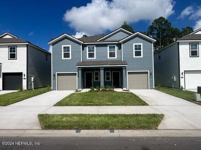 New construction Townhouse house 14576 Macadamia Lane, Unit 286, Jacksonville, FL 32218 - photo 1 1