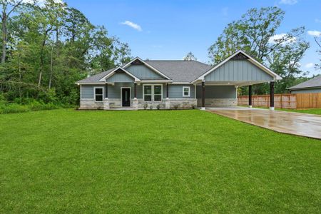 New construction Single-Family house 318 County Road 2221, Cleveland, TX 77327 - photo 0 0