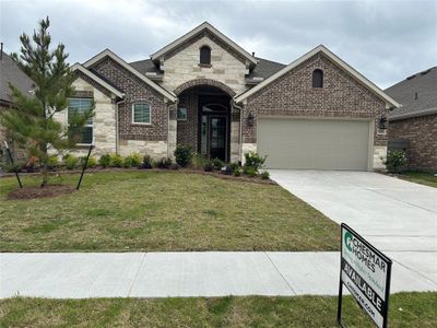 New construction Single-Family house 18338 Tiger Flowers Drive, Conroe, TX 77302 - photo 0 0