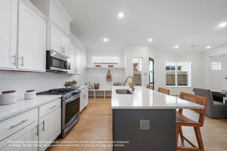 Sophistication Redefined: The kitchen's centerpiece—an elegant island—awaits the glow of your chosen pendant lights, making every moment in the heart of the home shine brighter.