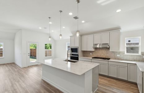 Eat-in island kitchen with abundant cabinet space