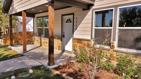 Property entrance featuring covered porch