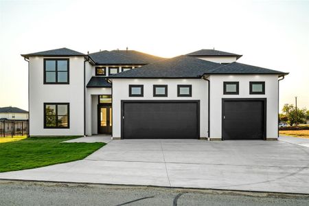 Prairie-style house with a front yard