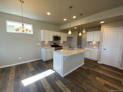 New construction Single-Family house 823 N Bently Street, Watkins, CO 80137 The Greenbriar- photo 1