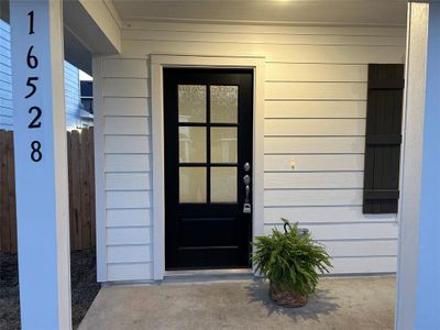 Inviting front entryway perfect for relaxation and unwinding.