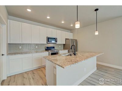 New construction Duplex house 5982 Rendezvous Pkwy, Timnath, CO 80547 Caraway- photo 18 18