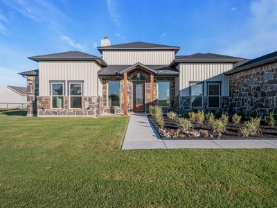 View of front of house featuring a front lawn