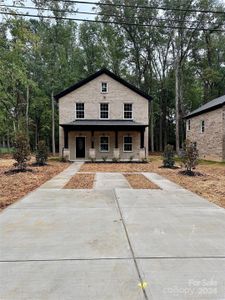 New construction Single-Family house 4703 Whispering Oaks Drive, Charlotte, NC 28215 - photo 0